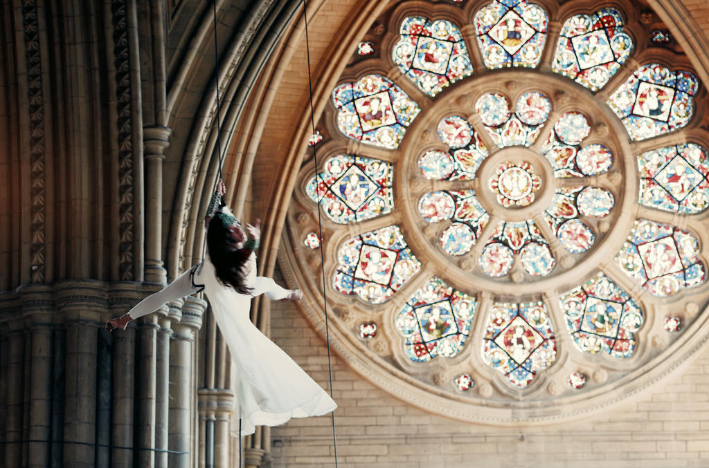 Ishita Raina from Yskynna Vertical Dance Company rehearsing in Truro Cathedral